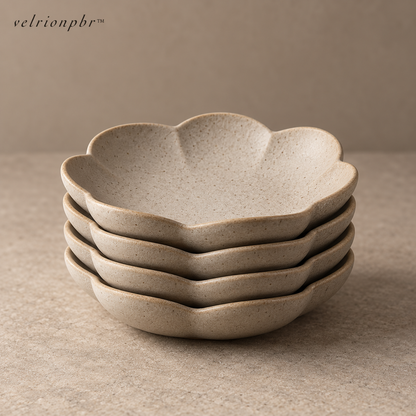 Bloomstack five-piece tasting plate set arranged as a sculptural stack and single flower-shaped plate