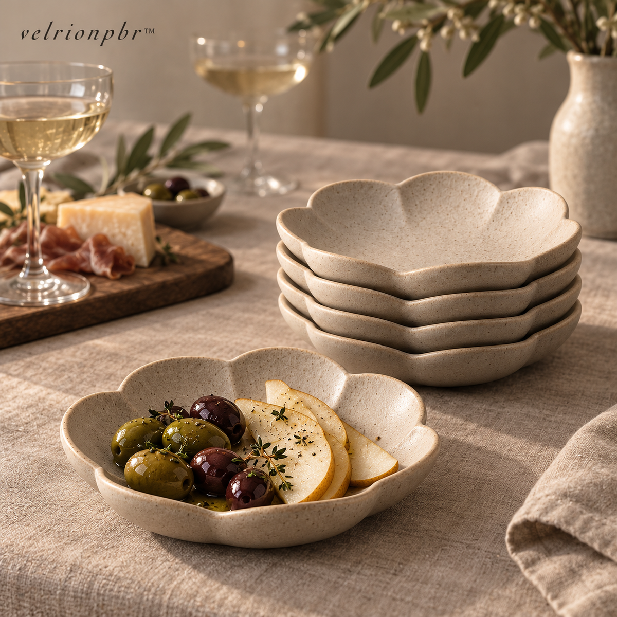 Bloomstack flower-shaped stoneware tasting plates styled on a muted table